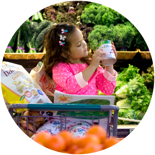 girl reading in supermarket