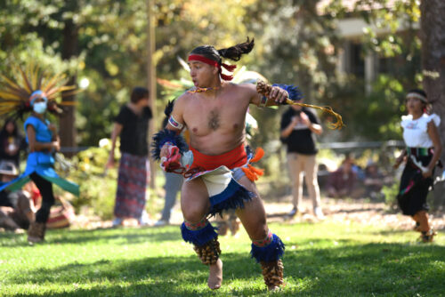 A man performing a tribal dance